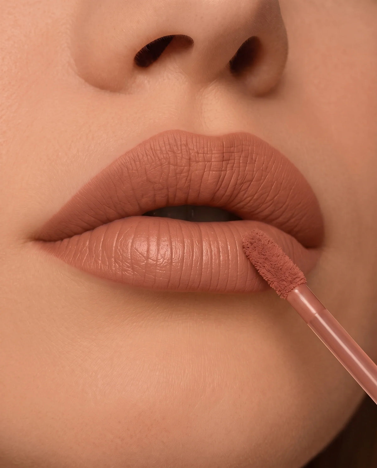 LuxMatte 24-Hour Lipstick in Rose Latte on lips