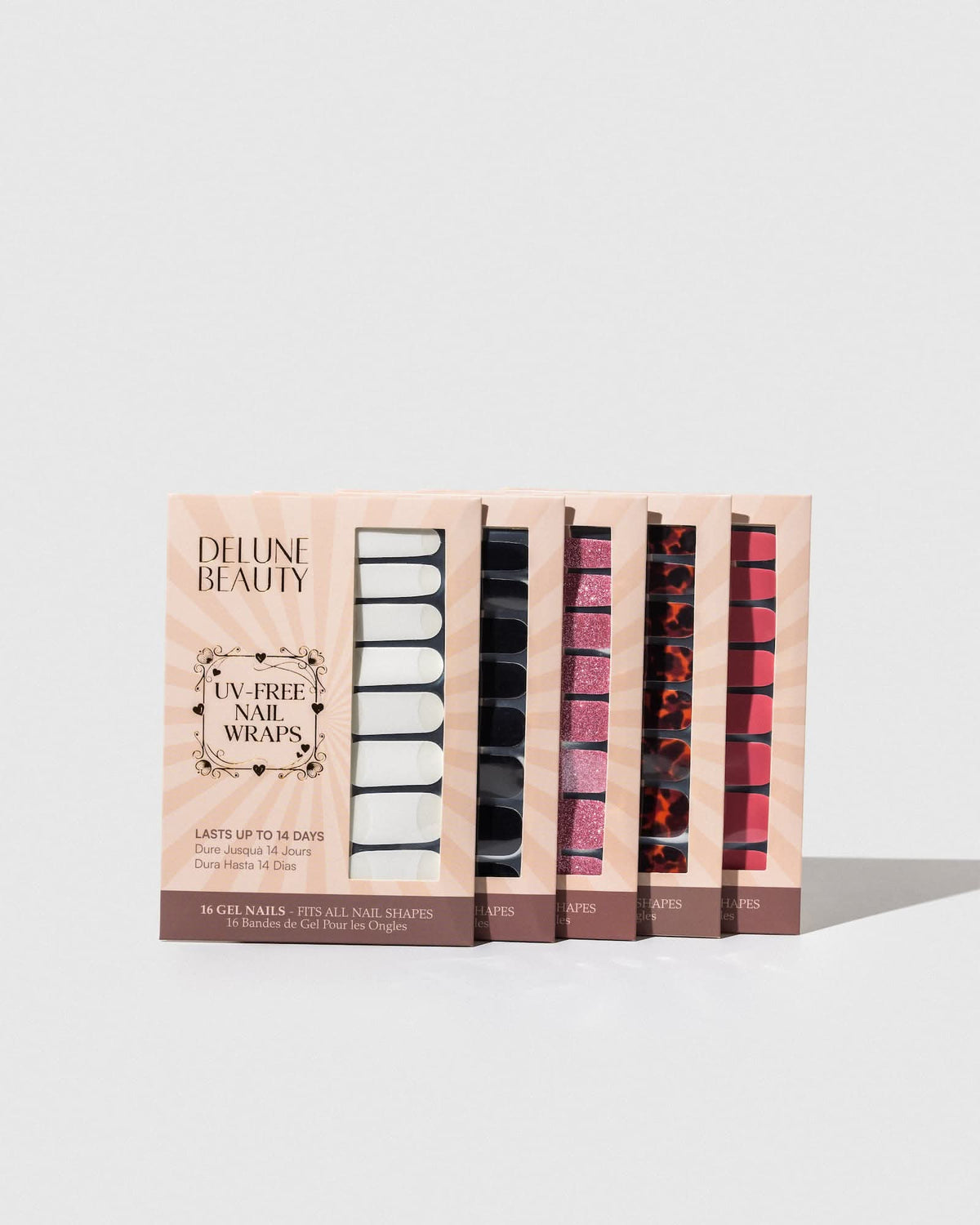 Blush (Non-UV Nail Wraps): row of Delune Beauty UV-free nail wrap packs standing upright